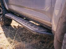 Step Edition Rock Slider For 24-Present Toyota Tacoma/Double Cab Short Bed W/ No Kick Out/Yes (Powdercoat)/Powdercoat Cali Raised LED